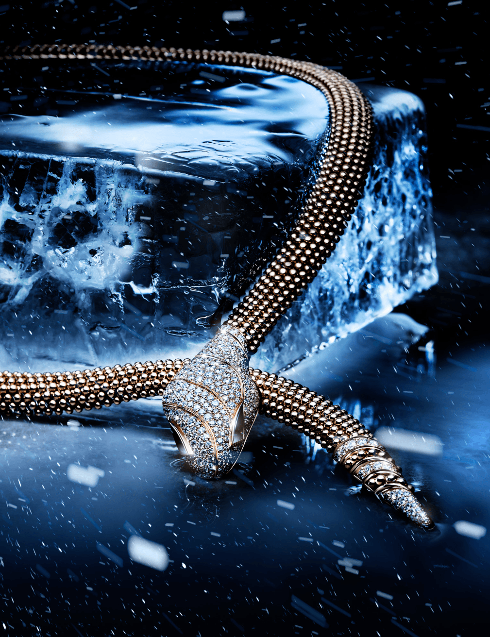 A diamond-encrusted snake-shaped jewelry piece resting on a reflective surface with water splashes around it.